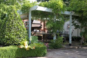 A pergola to shelter outside dining guests